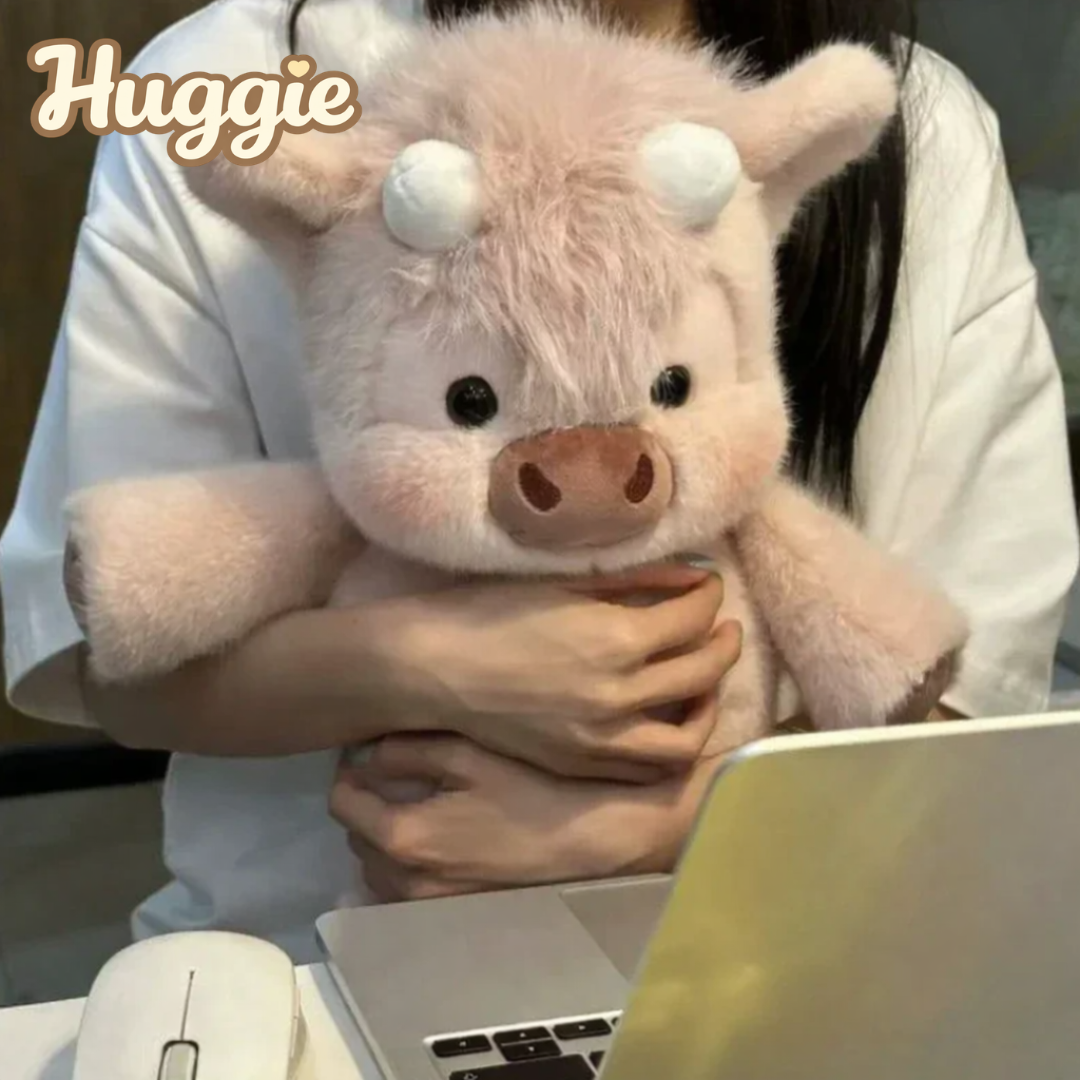 Huggie ® Peluche de vaca corredora